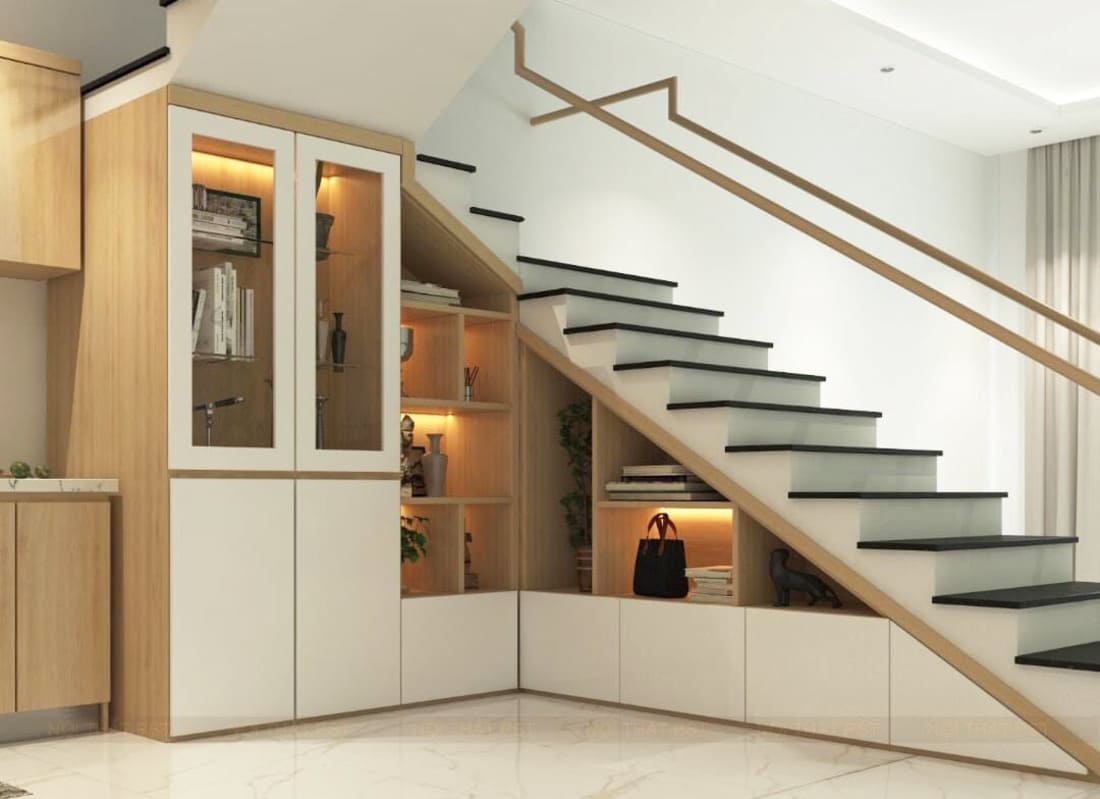 thiết kế cầu thang kính kết hợp tủ chân câu thang